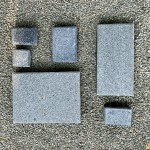 「會喝水的人行道」－新業(yè)利用環(huán)保材質的透水磚特性，許多的細小孔洞讓多餘的雨水可滲入土地，以達到水循環(huán)的作用。